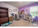 Functional home office with shelving, desk, and ample natural light for a productive workspace at 7527 Finnigan Rd, Charlotte, NC 28215
