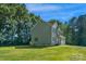 New construction featuring light siding, grassy yard, and a side-entry garage, perfect for outdoor enjoyment at 7874 Lucky Creek Ln, Denver, NC 28037