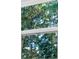 Window with a view of lush green trees at 7874 Lucky Creek Ln, Denver, NC 28037