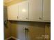 Utility room with storage cabinets and water hookups at 809 Ruth Ave, Kannapolis, NC 28083