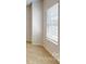Corner of bedroom with plush carpet and window at 8102 Jacey Ln # 24, Huntersville, NC 28078