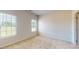 Bedroom features two windows and neutral walls at 8102 Jacey Ln # 24, Huntersville, NC 28078