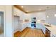 Modern kitchen features white cabinets, stainless steel appliances, and quartz countertops at 8102 Jacey Ln # 24, Huntersville, NC 28078