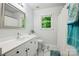Bathroom with marble floor, double sink vanity, and bathtub shower combo at 8217 Lansford Rd, Charlotte, NC 28277