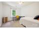 Bright bedroom with desk, storage, and comfortable bed with soft textures at 8217 Lansford Rd, Charlotte, NC 28277