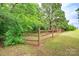 Expansive, fenced-in backyard provides plenty of space for outdoor activities at 8622 Lower Rocky River Rd, Concord, NC 28025