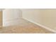 Neutral bonus room with neutral carpet, a closet, and base molding throughout at 8622 Lower Rocky River Rd, Concord, NC 28025