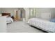 Bedroom featuring two beds, neutral walls, and carpeting at 9856 Caldwell Depot Rd, Cornelius, NC 28031