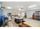 Bright craft room with wood flooring, plenty of storage, a large worktable, and a sink for creative projects at 9950 Foil Rd, Mount Pleasant, NC 28124