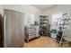 Garage space with storage, rolling toolbox, refrigerator, and natural light at 9950 Foil Rd, Mount Pleasant, NC 28124