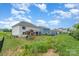 Fenced backyard with a play structure and storage shed at 10045 Carousel Corral Dr, Midland, NC 28107