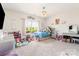 Playful bedroom featuring a large window, a stylish chandelier, and comfortable furnishings at 10045 Carousel Corral Dr, Midland, NC 28107