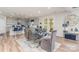 Bright and airy dining area connects to the kitchen, featuring a glass table and a backyard view at 10045 Carousel Corral Dr, Midland, NC 28107