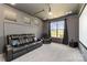 Home theater room featuring comfortable leather seating, a projector screen, and recessed lighting at 10045 Carousel Corral Dr, Midland, NC 28107