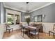 Elegant dining room with hardwood floors and stylish furnishings at 106 Kent Ct, Mooresville, NC 28117