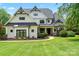 Charming two-story home with black trim, manicured landscaping and inviting curb appeal at 106 Kent Ct, Mooresville, NC 28117