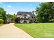 Beautiful two-story home with large yard, long driveway, perfect for families at 106 Kent Ct, Mooresville, NC 28117