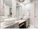 Bright bathroom with a double sink vanity, modern fixtures, and natural light at 111 Gordon Ave, Shelby, NC 28152