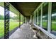 Comfortable front porch featuring decorative ironwork, stone floors, and ample space for relaxing at 111 Gordon Ave, Shelby, NC 28152