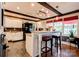 Bright kitchen with a large island, bar seating, and ample natural light from the nearby windows at 111 Gordon Ave, Shelby, NC 28152