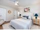 Well-lit bedroom with neutral decor, ceiling fan, and stylish furnishings at 1152 Penrose Ln, Charlotte, NC 28217