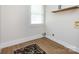 Compact laundry room with hookups, natural light and neutral decor at 1152 Penrose Ln, Charlotte, NC 28217
