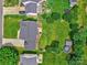 Expansive backyard view featuring a lush lawn, patio, manicured landscaping, and inviting space for outdoor activities at 121 Royalton Rd, Mooresville, NC 28115