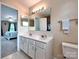 Bright bathroom featuring double sinks, ample counter space, and neutral décor at 121 Royalton Rd, Mooresville, NC 28115