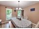 Cozy dining room featuring natural light, a chandelier, and seating for six at 121 Royalton Rd, Mooresville, NC 28115