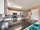 Well-equipped kitchen featuring stainless steel appliances and granite countertops with tile backsplash at 121 Royalton Rd, Mooresville, NC 28115