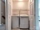 Convenient laundry closet with washer and dryer hookups and shelving at 121 Royalton Rd, Mooresville, NC 28115