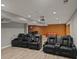 Spacious basement featuring a projector and tiered seating for entertainment at 12923 Plumleaf Dr, Charlotte, NC 28213