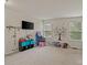 Spacious playroom with toys and lots of open space at 12923 Plumleaf Dr, Charlotte, NC 28213