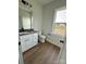 Bright bathroom with granite vanity and modern toilet at 1308 Austin Chaney Rd, Wingate, NC 28174