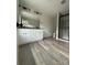A modern bathroom features a double vanity and a glass-enclosed shower at 1308 Austin Chaney Rd, Wingate, NC 28174