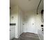 A bright bathroom featuring a vanity and tub shower with black hardware and fixtures at 1308 Austin Chaney Rd, Wingate, NC 28174