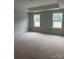 A bedroom under construction with two windows allowing ample natural light at 1308 Austin Chaney Rd, Wingate, NC 28174