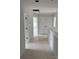 Hallway featuring multiple rooms and a closet that provide ample storage space at 1308 Austin Chaney Rd, Wingate, NC 28174