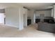 An unfinished kitchen featuring white upper cabinets, dark lower cabinets, and a center island at 1308 Austin Chaney Rd, Wingate, NC 28174
