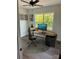 A well-lit office space with a modern desk, comfortable chair, and scenic outdoor views at 1308 Austin Chaney Rd, Wingate, NC 28174