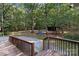 View from deck of treed back yard including storage shed and picnic table at 14415 Old Beatty Ford Rd, Gold Hill, NC 28071