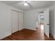 Bedroom with hardwood flooring, closet, and access to a bathroom at 14415 Old Beatty Ford Rd, Gold Hill, NC 28071