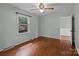 Bedroom featuring hardwood floors and a window at 14415 Old Beatty Ford Rd, Gold Hill, NC 28071