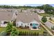 Aerial view of the home showcasing the patio, backyard, and surrounding neighborhood at 16034 Rushwick Dr, Huntersville, NC 28078