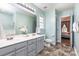 Stylish bathroom with double sinks, modern fixtures, and neutral colors offers a spa-like experience at 1626 Riverglenn Ct, Rock Hill, SC 29732