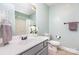 Bright bathroom with a spacious vanity, and neutral tiling provides a relaxing retreat at 1626 Riverglenn Ct, Rock Hill, SC 29732