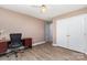 Bedroom featuring wood floors, closet, and desk creating an ideal workspace at 1626 Riverglenn Ct, Rock Hill, SC 29732