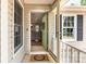 Inviting front entrance with open door and a welcoming wreath decor at 1626 Riverglenn Ct, Rock Hill, SC 29732