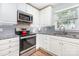 Well-equipped kitchen featuring granite countertops and stainless steel appliances at 1626 Riverglenn Ct, Rock Hill, SC 29732