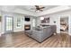 Cozy living room featuring a fireplace, gray couch, and hardwood floors at 1626 Riverglenn Ct, Rock Hill, SC 29732